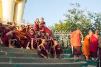 Monks at the Entrance to the Kyaikhteeyoe Pagoda